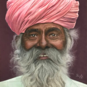 Portrait of a man with a pink turband